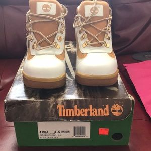 White leather and tan suede Timberlandboots.